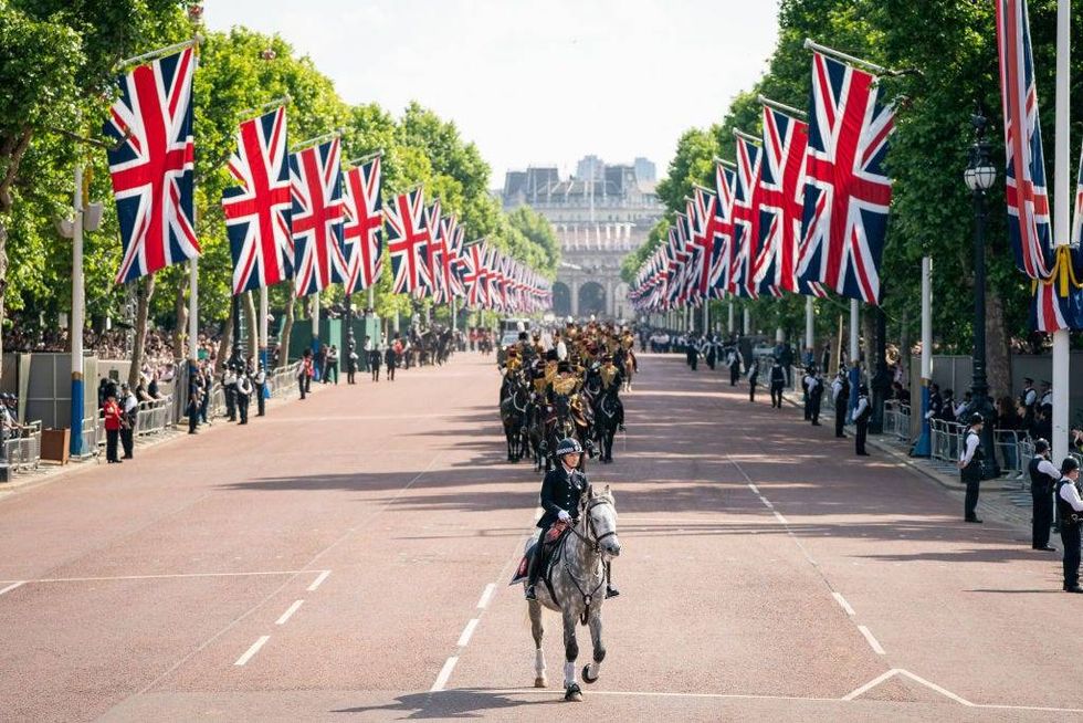 The Royal Procession leaves Buckingham Palace for the Trooping Trooping the Colour parade on June 2, 2022 in London, England.
