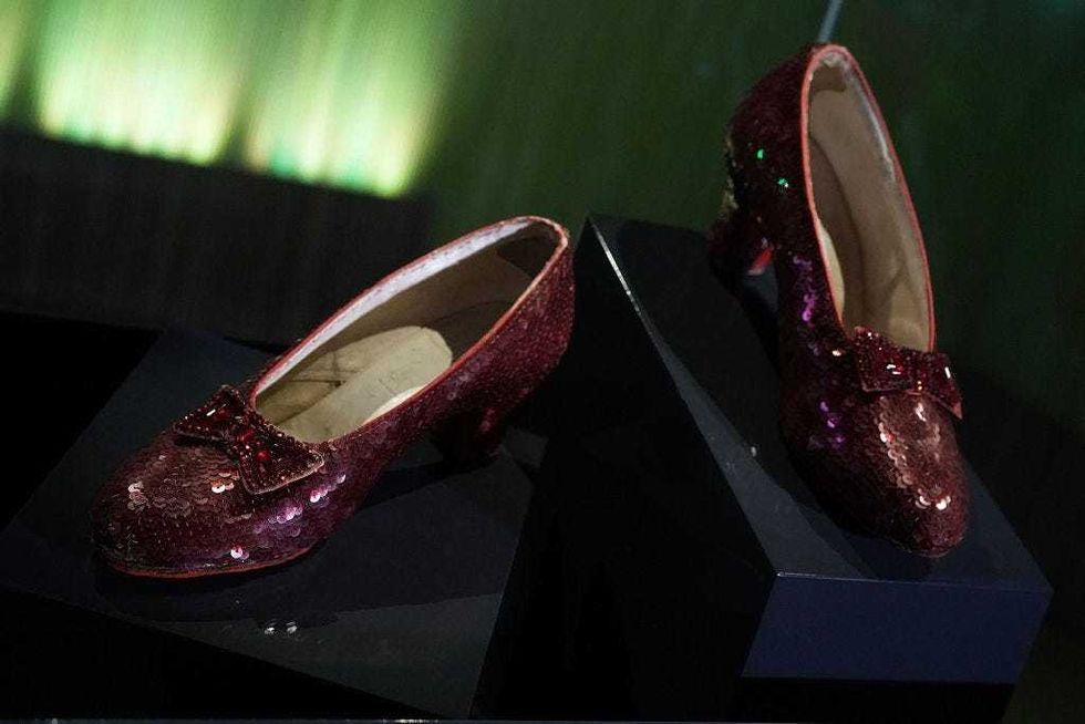 The "ruby slippers" which Judy Garland wore during the 1939 filming of The Wizard of Oz are put on display during a press preview for the exhibit "Ray Dolby Gateway to American Culture" at the Smithsonian National Museum of American History October 17, 2018 in Washington, DC. The shoes return to public display as part of the new exhibition, which explores American history and culture, after an 18-month research and conservation treatment. The show will open to the public on October 19, 2018. (Photo by Alex Wong/Getty Images)
