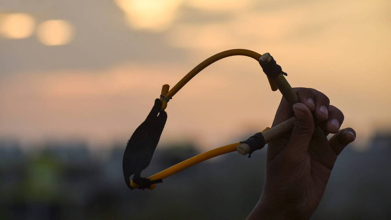 The Santa Clara County District Attorney’s Office asked for the public’s help Thursday to find a person – or people – suspected of using a slingshot to fire metal bearings into windows located along the Guadalupe Freeway.
