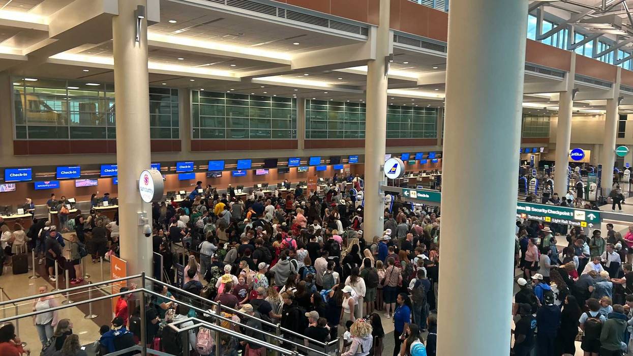 The scene Friday morning at MSP Airport with flight delays and cancellations leading to a chaotic scramble for travelers.