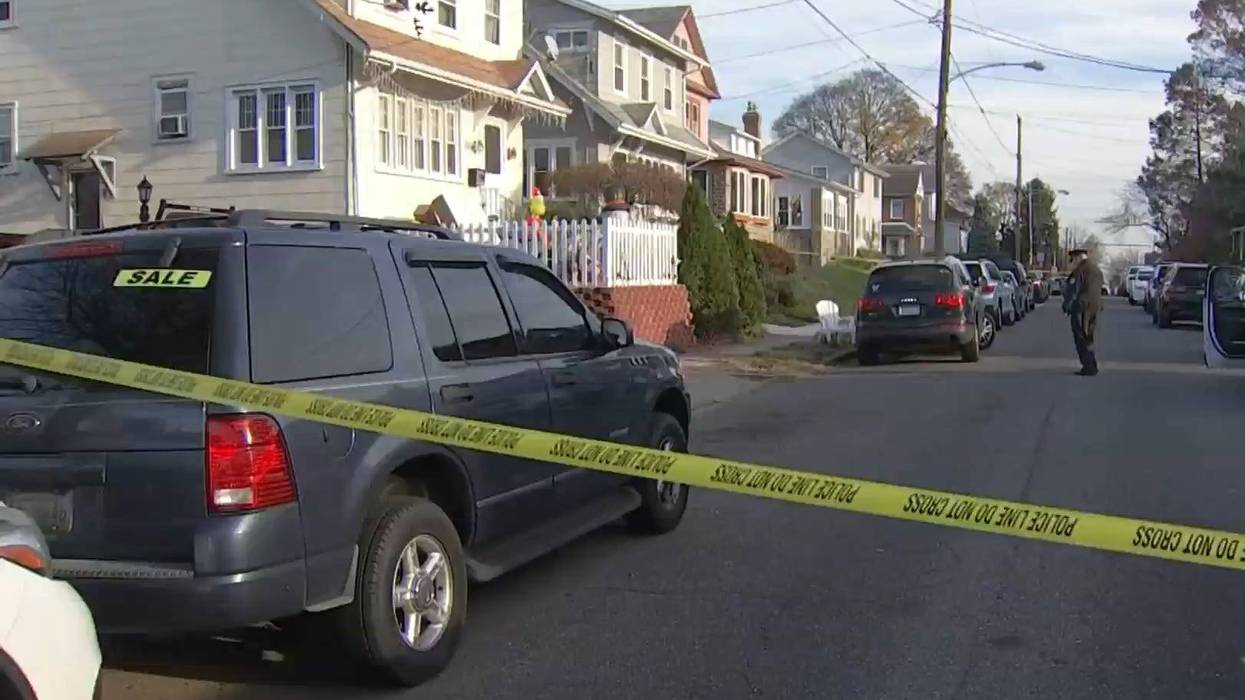 The scene of a police investigation after a woman's body was decapitated.