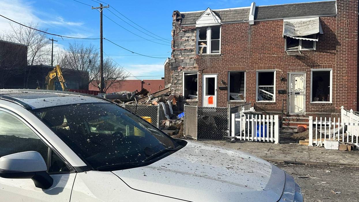The scene of an explosion that damaged two row homes in Port Richmond in the early morning of New Year's Day.