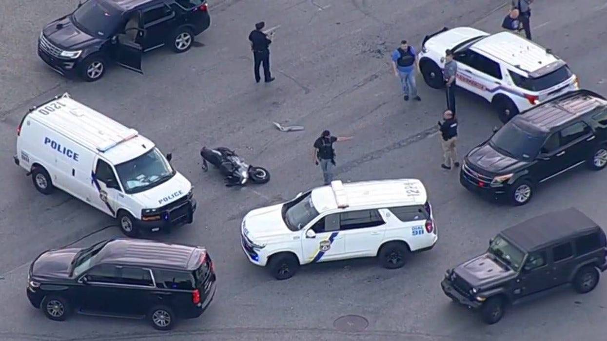 The scene where someone fired shots at police and stole a law enforcement vehicle.