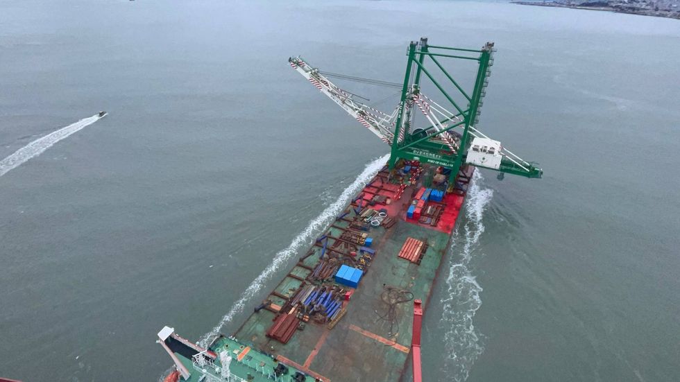 The ship heads to the Bay Bridge after slipping under the Golden Gate Bridge.