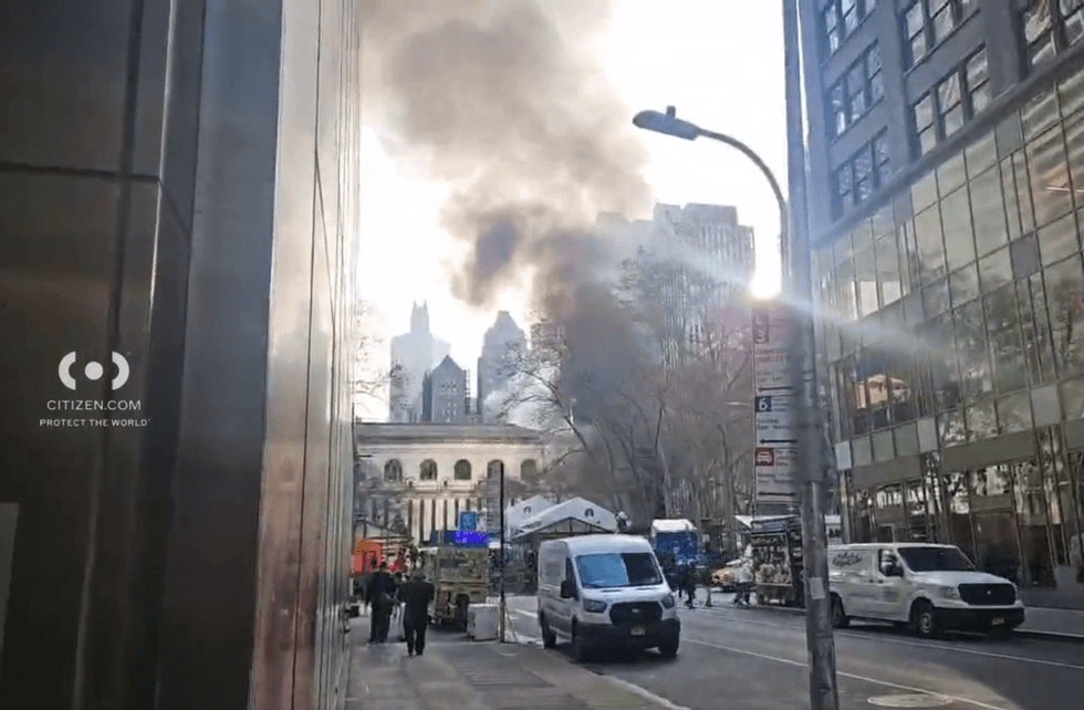 The smoke rose above the park as the FDNY responded