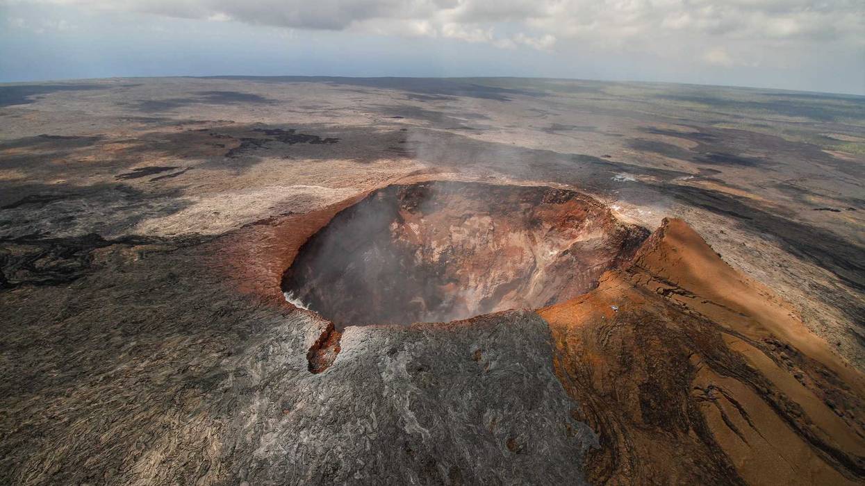The smoking crater of the volcano Mauna Loa on Big Island, Hawaiian archipelago, in Volcanoes National Par.