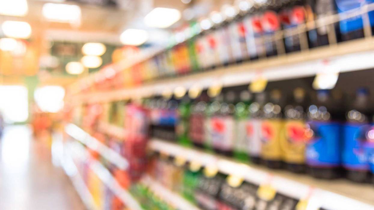 The soda aisle at a grocery store.