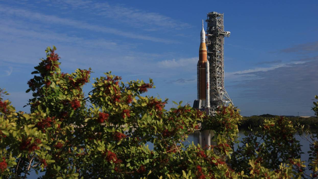 The Space Launch System rolls out to the pad ahead of Artemis II launch