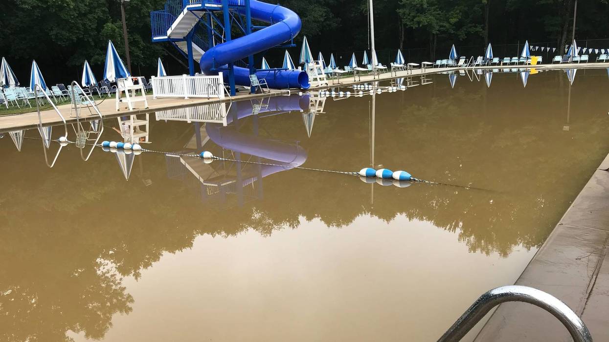 The Springfield Swim Club is a muddy mess this morning. The Darby Creek flooded yesterday and this place was underwater.
