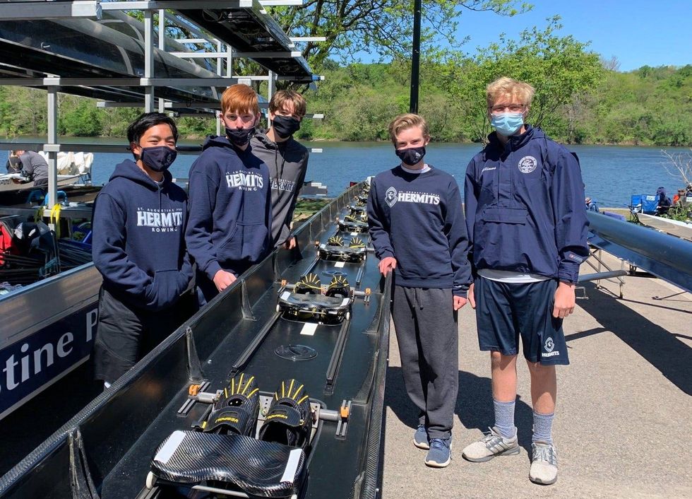 The St. Augustine Prep Hermits prepare to compete in the Philadelphia Scholastic Rowing Association City Championship regatta.