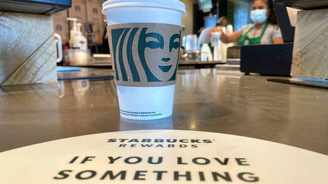 The Starbucks logo is displayed on a cup at a Starbucks store on October 29, 2021 in Marin City, California.