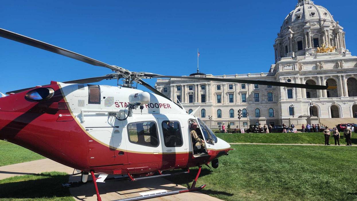 The State Patrol’s chief pilot landed a brand new twin-engine helicopter just outside the front door of the capitol building in St. Paul Monday.