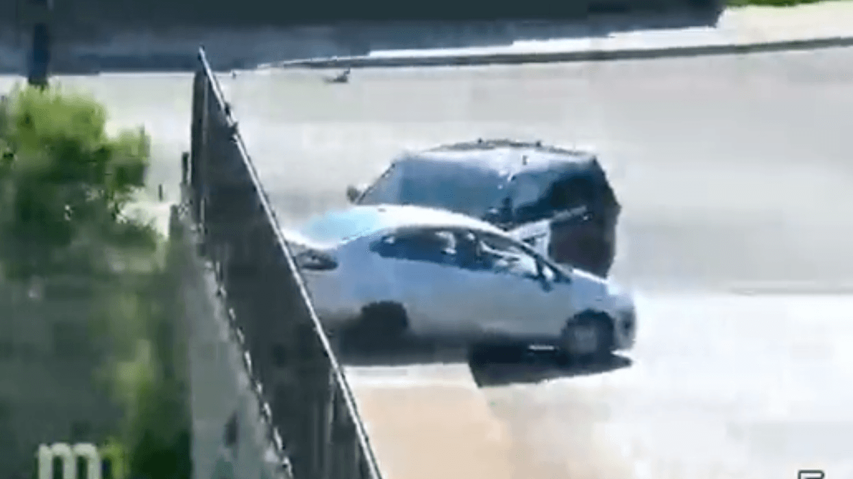 The state trooper and fleeing vehicle after the PIT maneuver was completed.