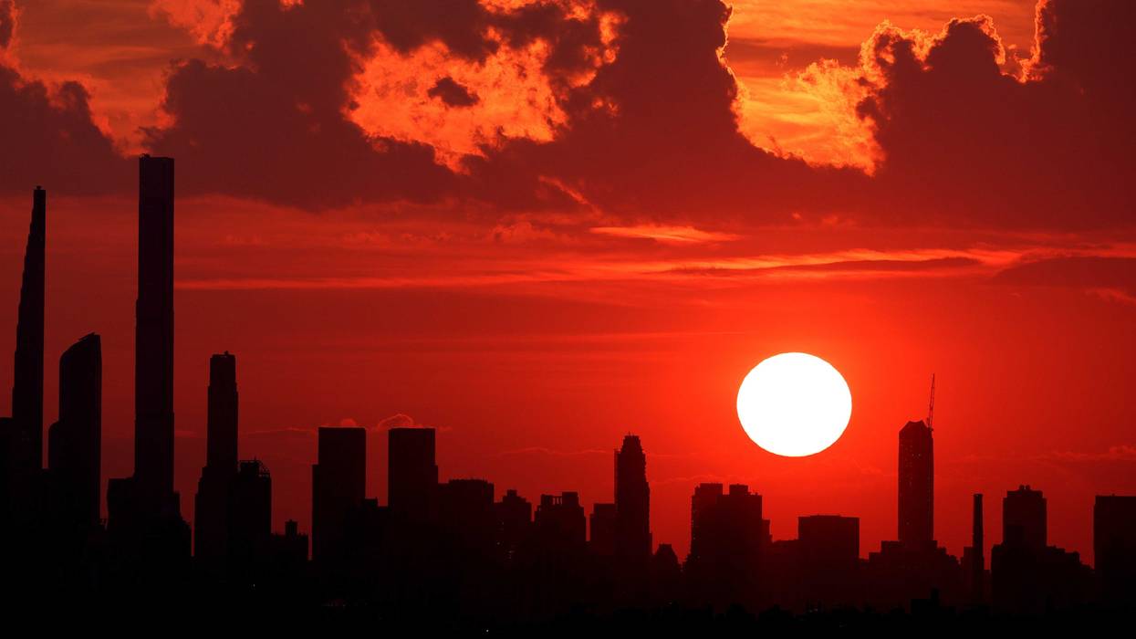 The sun is seen over Manhattan on Aug. 26, 2024