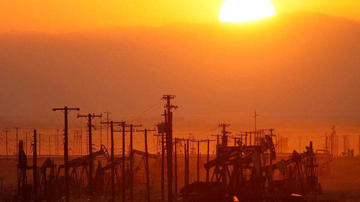 The sun rises over an oil field over the Monterey Shale formation where gas and oil extraction using hydraulic fracturing, or fracking, is on the verge of a boom on March 24, 2014 near Lost Hills, California. Critics of fracking in California cite concerns over water usage and possible chemical pollution of ground water sources.