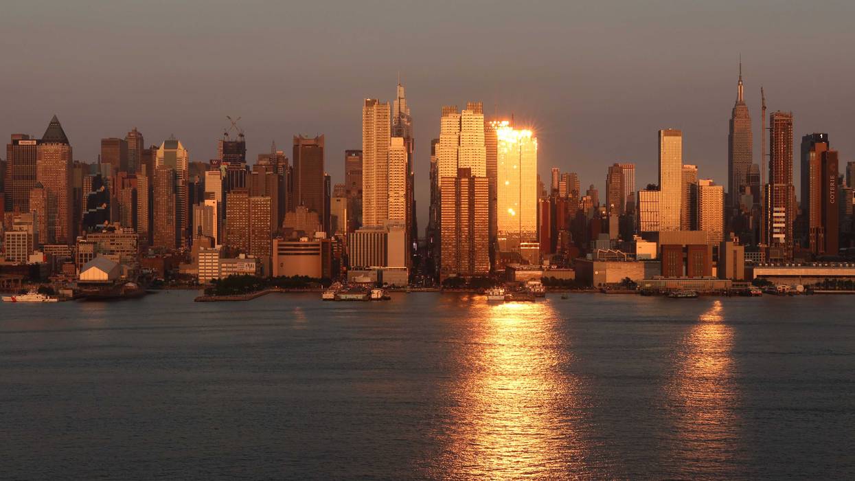 The sun sets on the skyline of Midtown on May 31, 2023, as seen from Weehawken, New Jersey