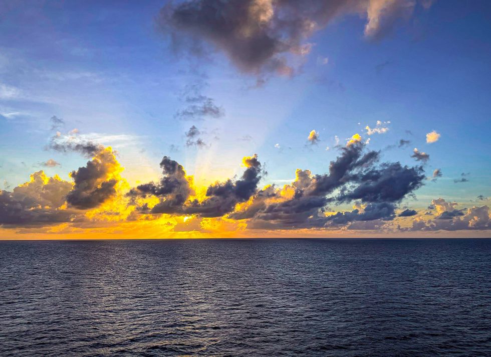 The sun sets over the Atlantic Ocean.