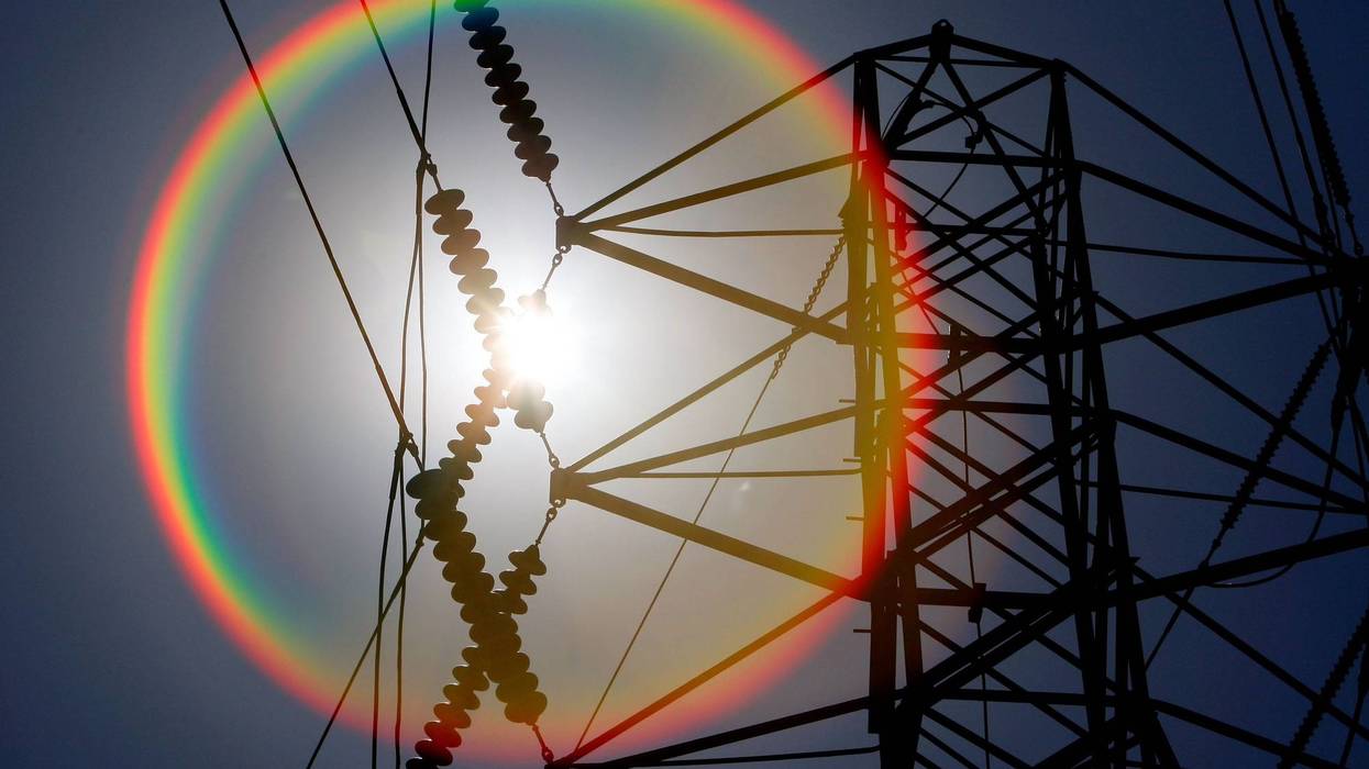 The sun shines over towers carrying electical lines August 30, 2007 in South San Francisco, California.