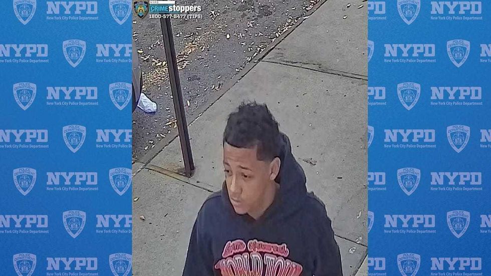 The suspect is believed to be approximately 16 to 20 years old and was last seen wearing a black hooded sweatshirt with the words "World Tour 1988" on the front, black sweatpants, red and black sneakers, a small circle tattoo on the right side of his face.