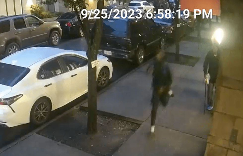 The suspect is seen running down a sidewalk minutes after the 6:25 p.m. shooting