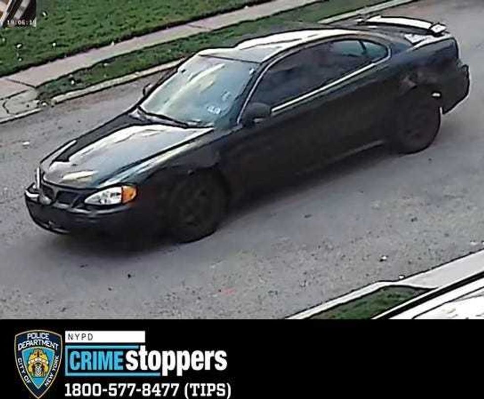 The suspects drove off in a Pontiac Grand Am, police said