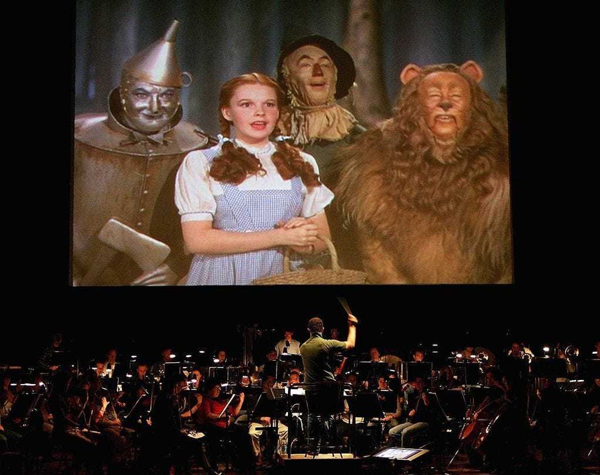 The Sydney Symphony Orchestra during a rehearsal of "The Wizard of Oz" in front of a big screen in the Concert Hall of the Sydney Opera House June 21, 2006 in Sydney, Australia. The classic 1939 "The Wizard of Oz" movie will be shown at Sydney's famous Opera House, with all the original orchestral sound removed and replaced with the musical score played live by the Sydney Symphony. (Photo by Patrick Riviere/Getty Images)