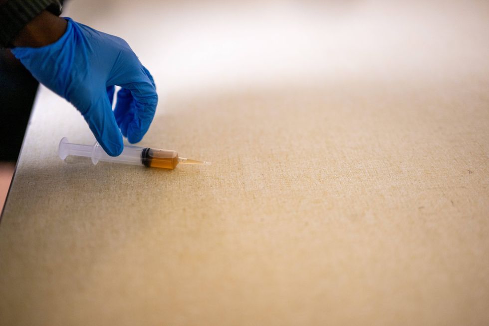 The syringe an individual used in an attempted attack on Rep. Ilhan Omar (D-MN) during a town hall meeting at the Urban League Twin Cities facility is seen on January 27, 2026 in Minneapolis, Minnesota. A person holding a syringe charged Omar