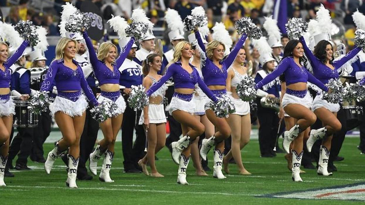 The TCU Horned Frogs cheerleaders perform prior to the game against the Michigan Wolverines in the Vrbo Fiesta Bowl at State Farm Stadium on December 31, 2022