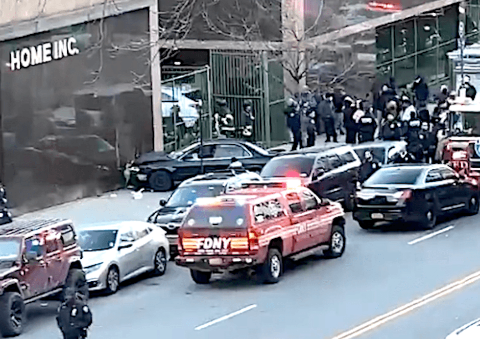 The totaled car is seen outside the R G Ortiz Funeral Home after the crash