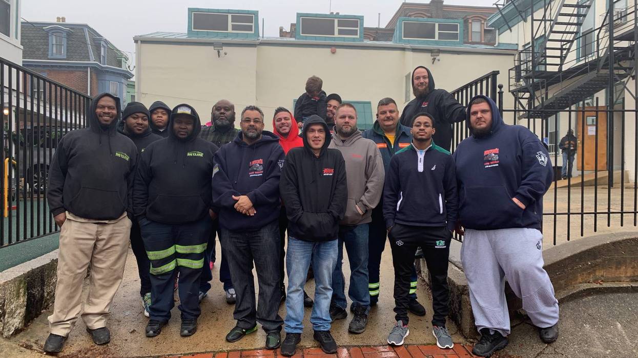 The Tows for Tots drivers, including Charles Norton, who organized the donation effort.