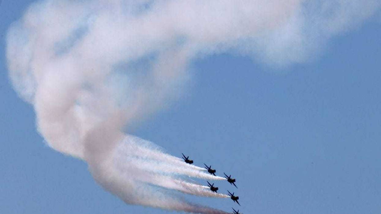 The U.S. Navy Blue Angels fly across the nation's capital during a tribute to healthcare workers.
