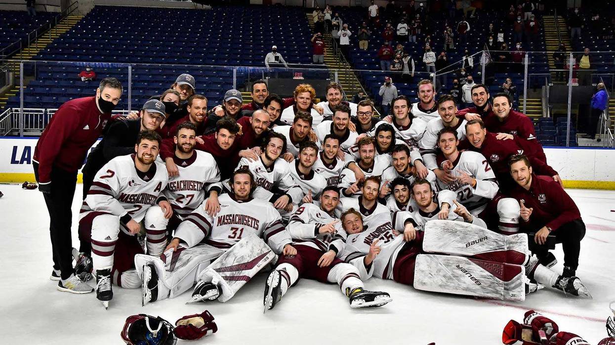 The UMass Minutemen celebrate their berth in the 2021 Frozen Four