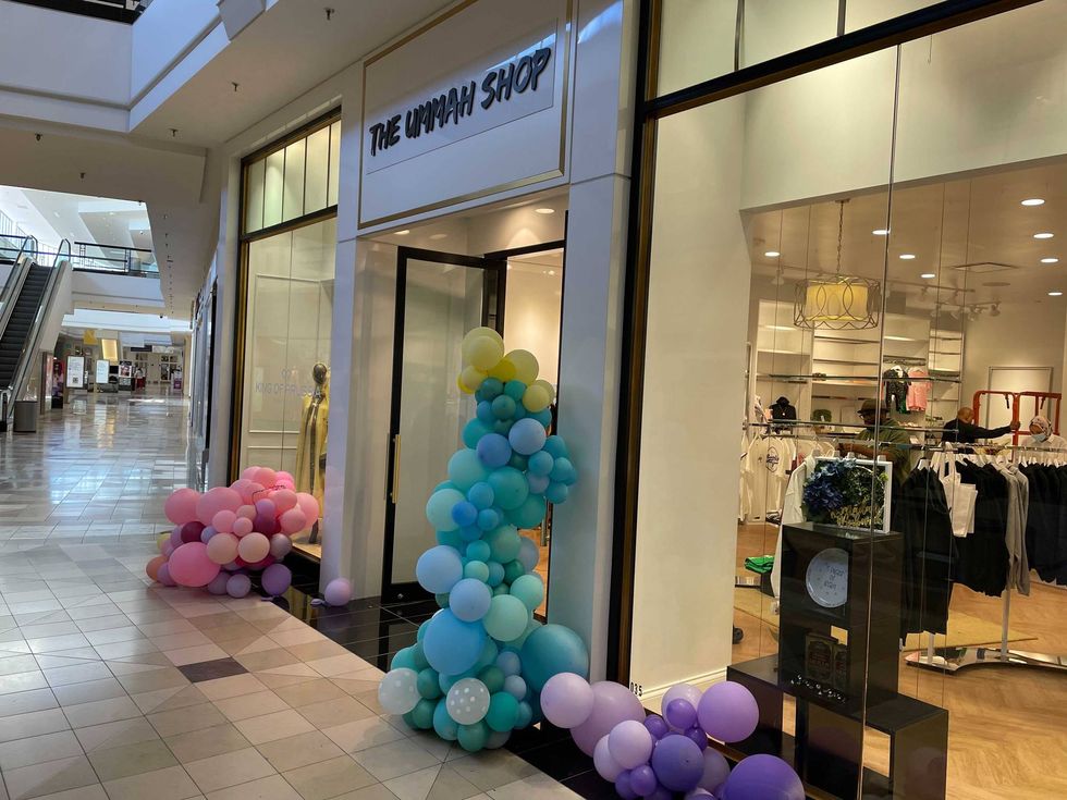 The Ummah Shop is located on the lower level of mall, between Macy