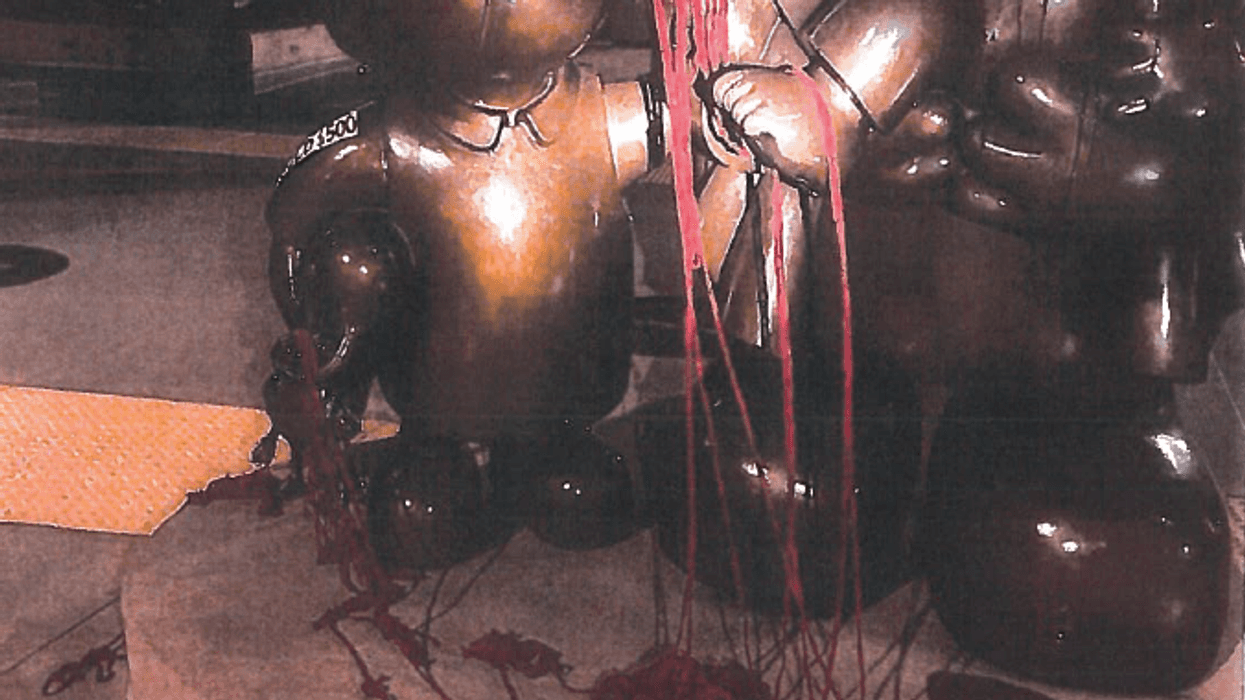 The vandalized bronze statue of the Madonna and Child.