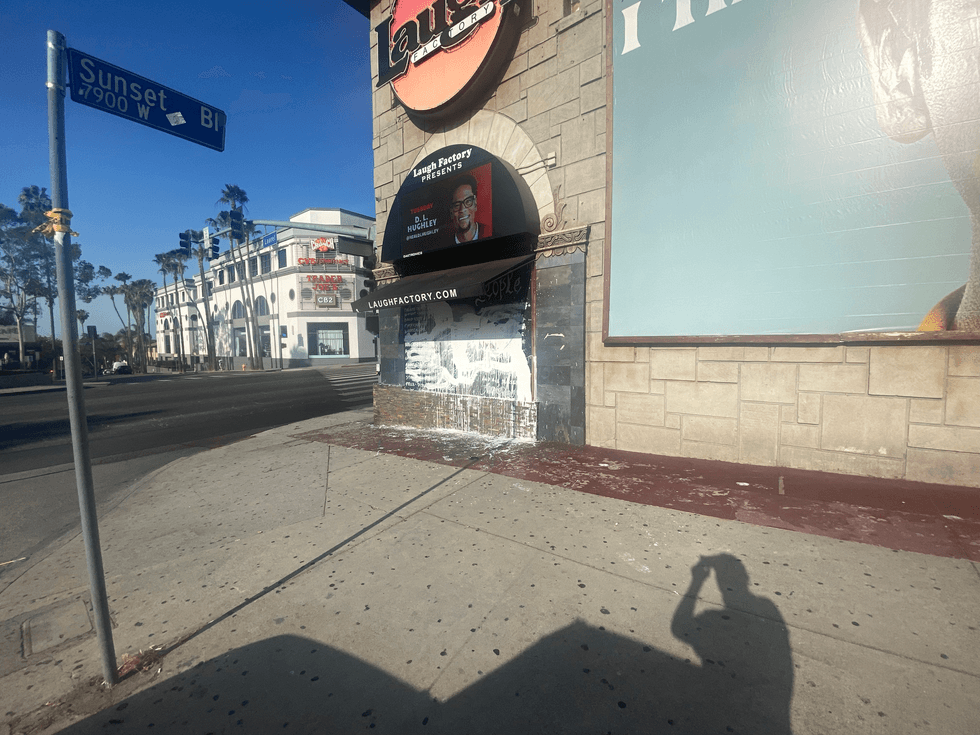 The vandalized mural.