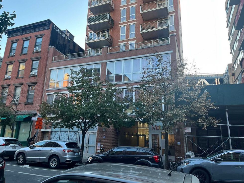 The victim lived at the building where she was shot and killed