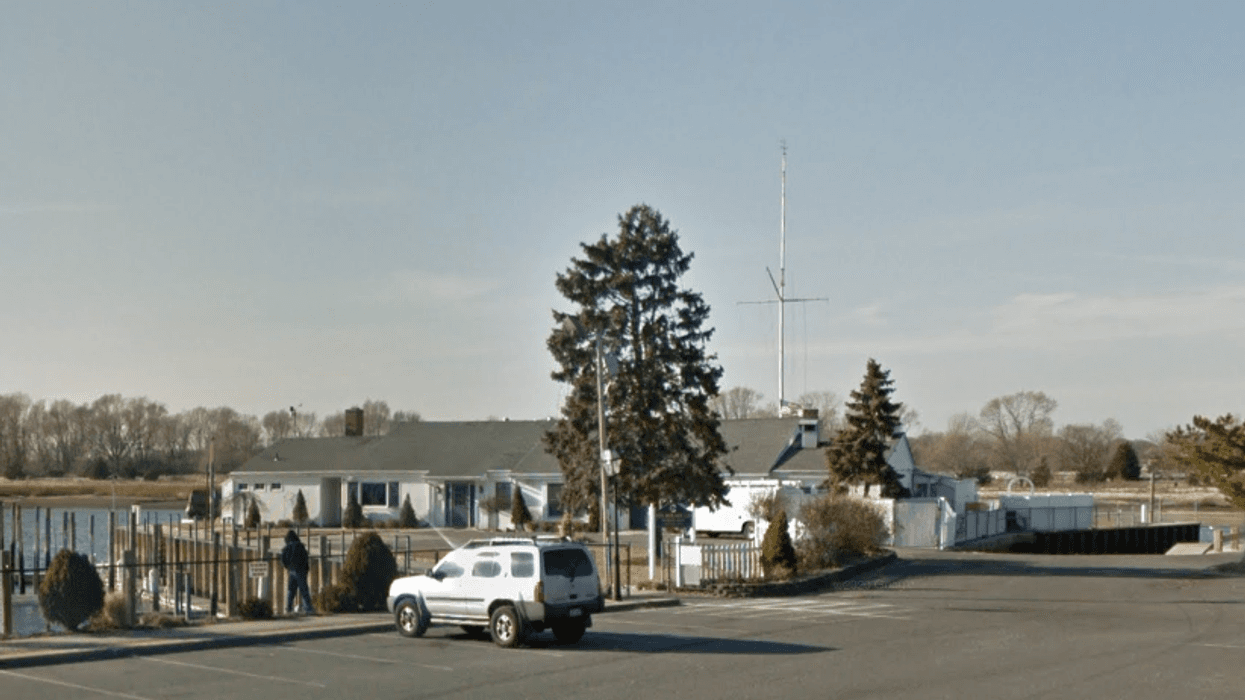 The victim was found fatally stabbed outside the Stony Brook Yacht Club on Shore Road