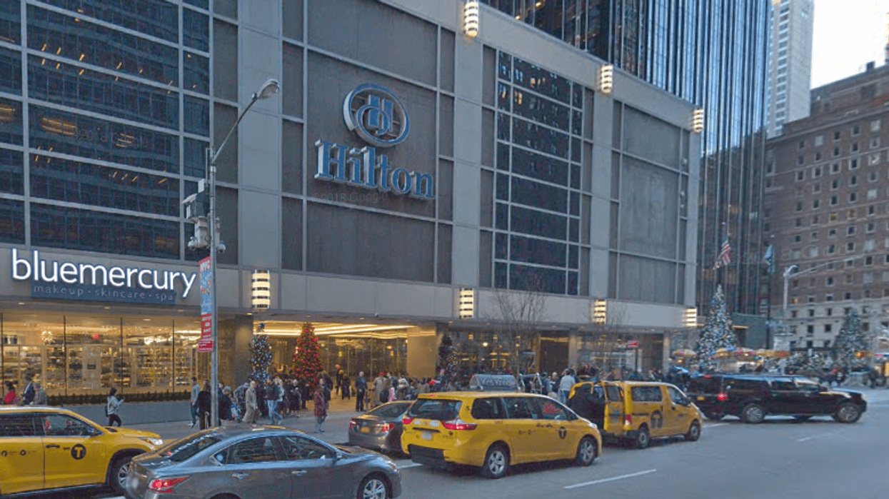 The victim was shot at Hilton Club The Residences at West 54th Street and Sixth Avenue
