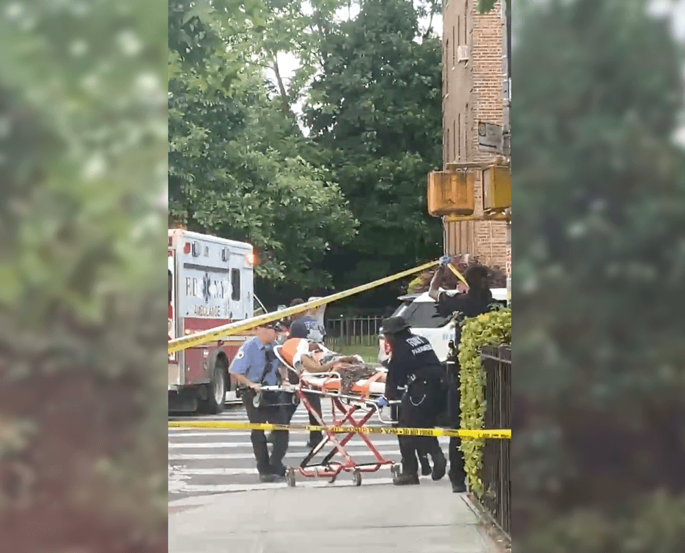 The victim was struck as she sat on a street corner