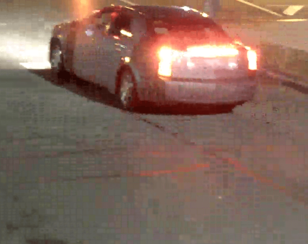 The victims told police a male suspect in the rear passenger side of a silver Cadillac had shot at them. The Cadillac was described as having blue tape on top section of the windshield.