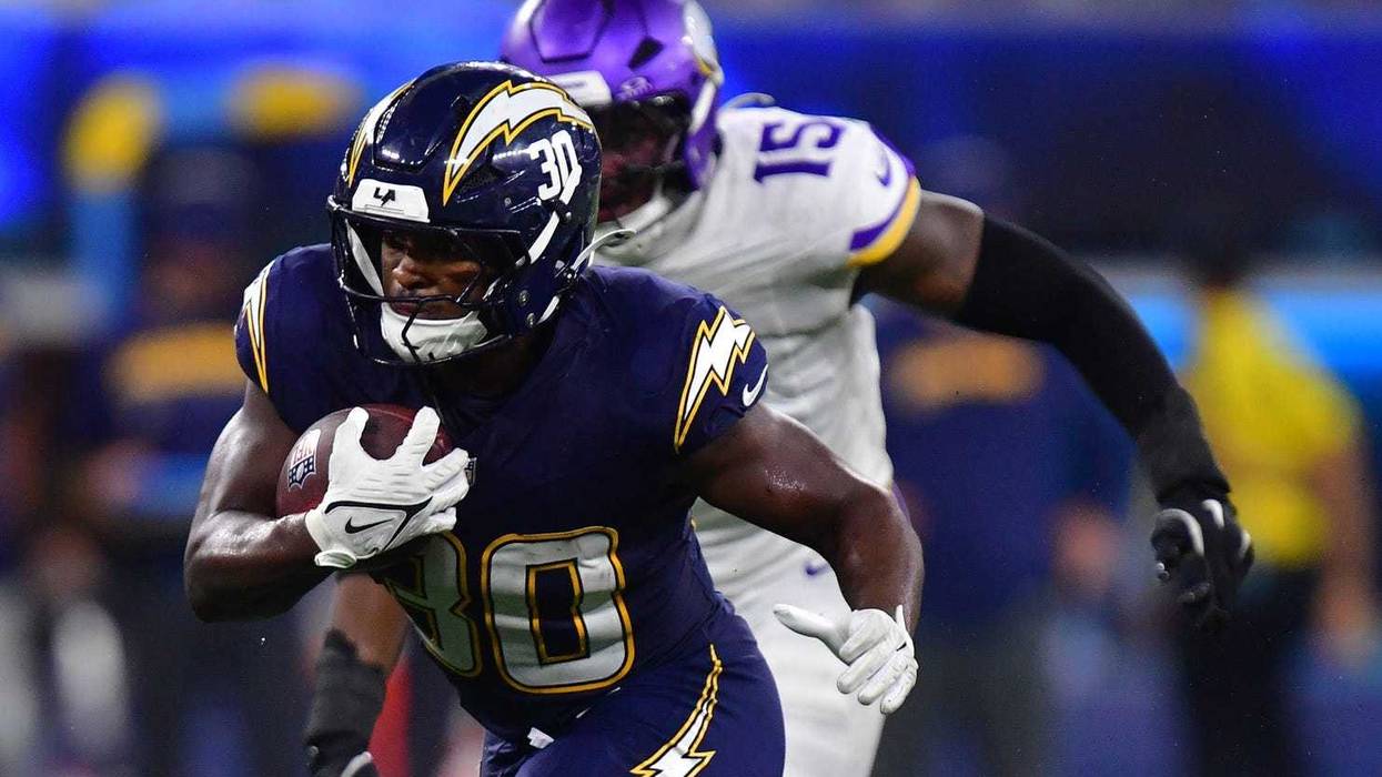 The Vikings spent most of Thursday night chasing Los Angeles Chargers running back Kimani Vidal (30) from behind. Vidal and QB Justin Herbert gashed them on the ground for over 200 yards in the 37-10 loss.