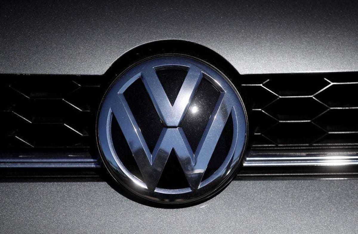 The VW logo is displayed in the front of a brand new Volkswagen car that is displayed at a Volkswagen dealership on February 23, 2018 in Richmond, California.