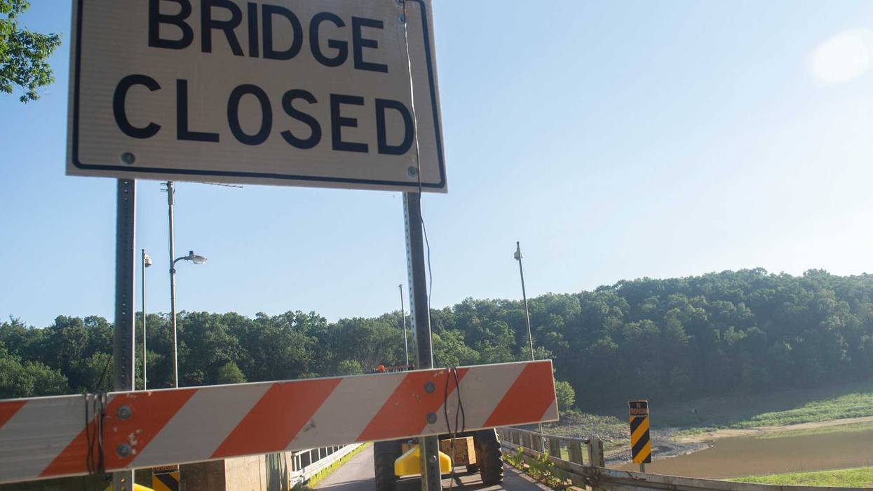 The Water Street Bridge has been closed since summer 2018. On Wednesday, June 26, 2019 members Kinsley Construction pour concrete over a pipeline connecting the Lake Williams dam valves. Once the concrete is poured, Lake Williams will be refilled. The lak