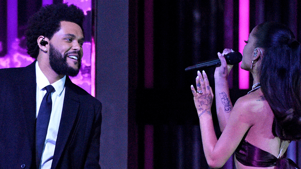 The Weeknd and Ariana Grande perform onstage
