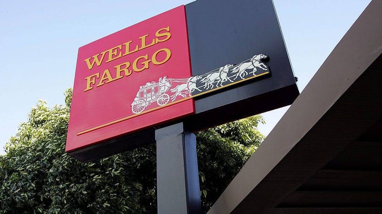 The Wells Fargo logo is seen on a sign outside of a Wells Fargo Home Mortgage branch office March 20, 2007 in San Francisco, California.