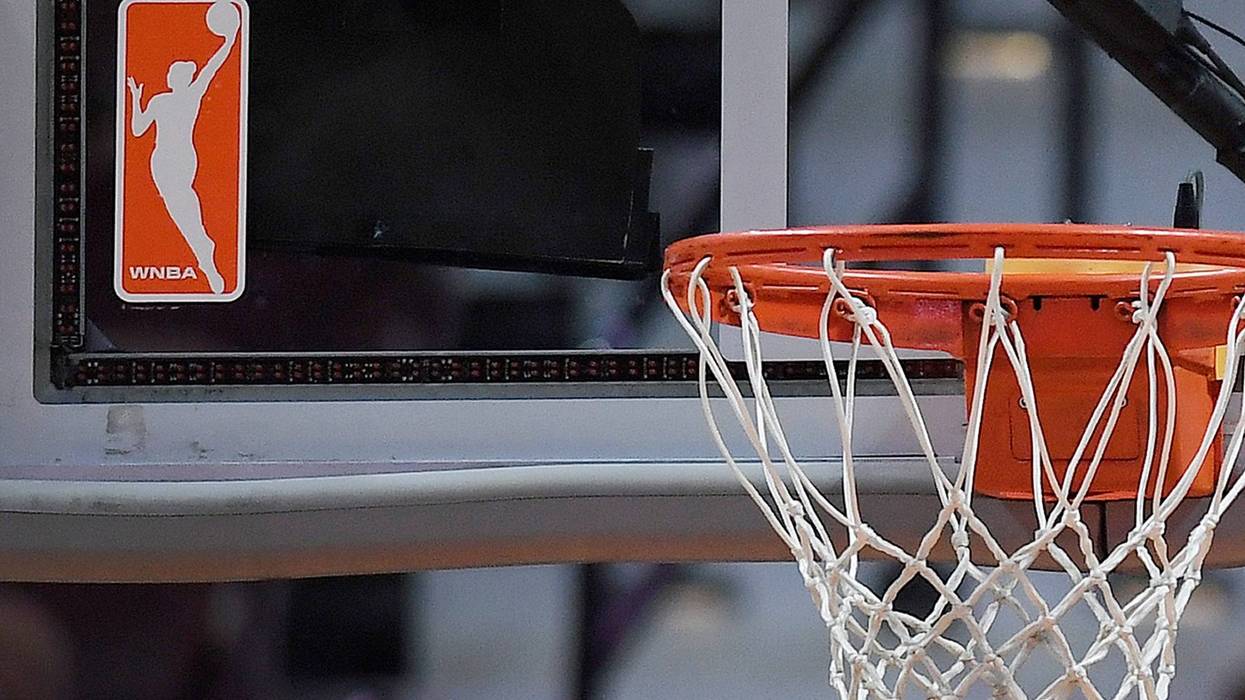 The WNBA logo is seen near a hoop before an WNBA basketball game at Mohegan Sun Arena, Tuesday, May 14, 2019, in Uncasville, Conn.
