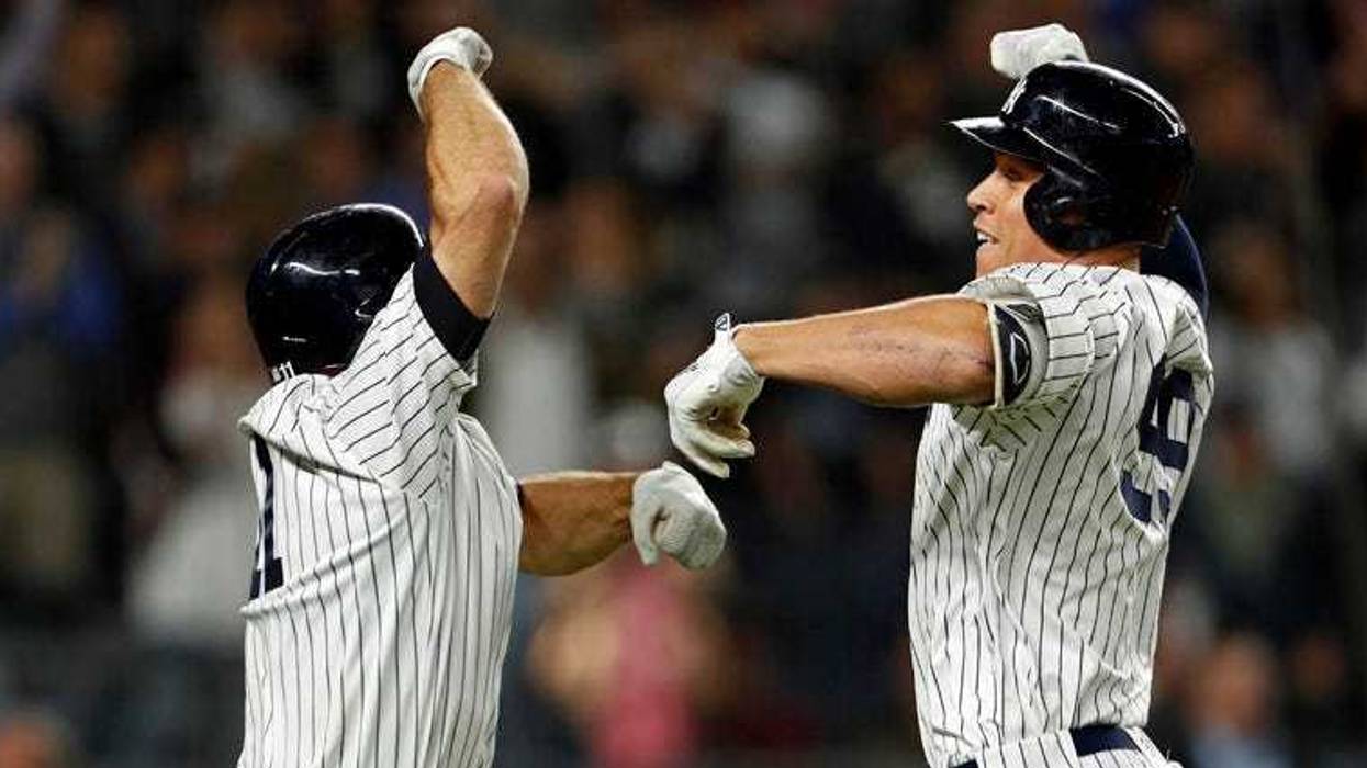 The Yankees' Aaron Judge celebrates a two-run homer with Brett Gardner against the Red Sox on May 9, 2018, at Yankee Stadium.