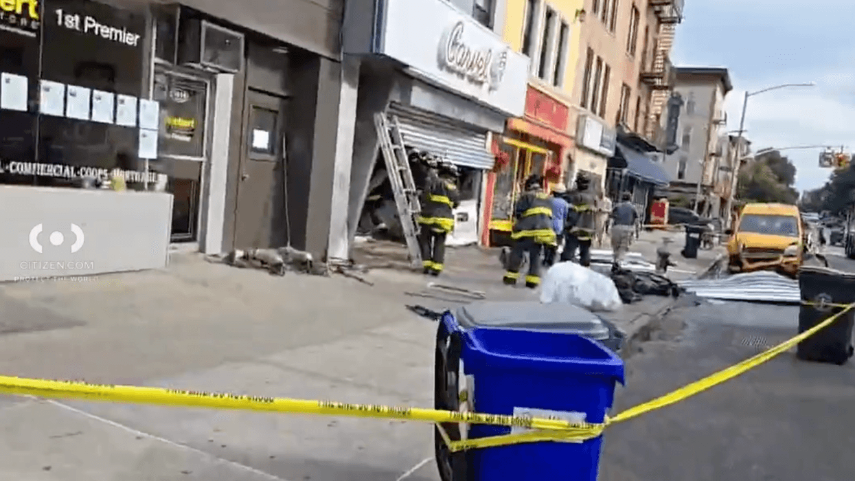 The yellow cab (pictured) smashed into the Carvel on Third Avenue in Bay Ridge