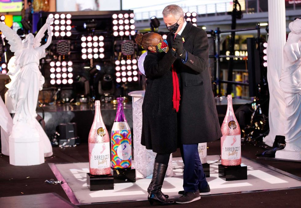 Then-Mayor Bill de Blasio dances with his wife Chirlane McCray in Times Square on New Years Eve on Dec. 31, 2020