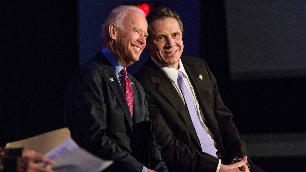 Then-Vice President Joe Biden (L) and New York Governor Andrew Cuomo attend a rally for paid family leave on January 29, 2016 in New York City.
